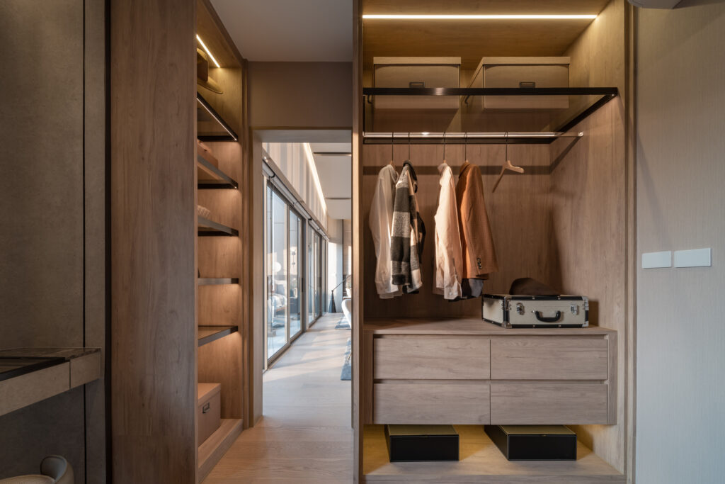 Modern wardrobe with stylish spring clothes and accessories